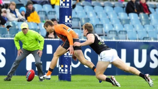 Empty seats: Only 6500 people turned up to see GWS take on Port Adelaide at Manuka at the weekend.