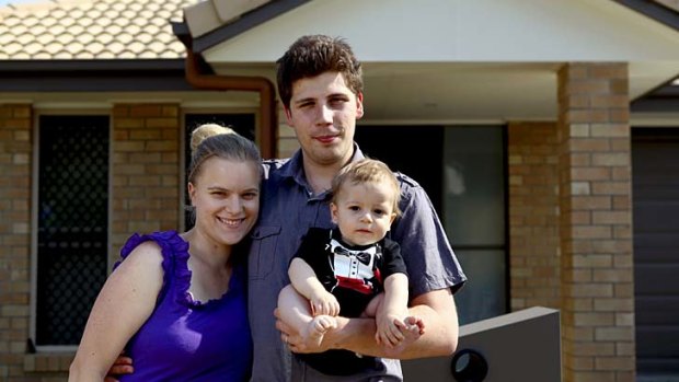Forced to declare bankruptcy ... Daniel Bostock with his wife, Summer, and nine-month-old son, Izaiah.