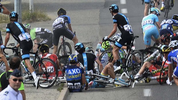 Spanish star Alberto Contador, No.91 above, was among a host of riders caught in a major pile up during stage one.