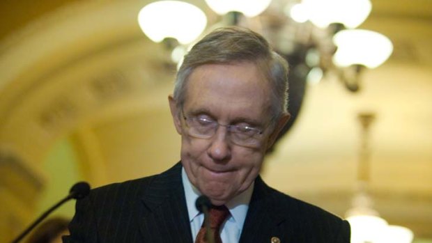 US Senate Majority Leader Harry Reid says that the downgrade of the US credit rating is a wake-up call.