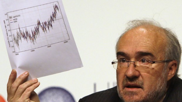 Michel Jarraud, Secretary-General of the World Meteorological Organization, holds up a temperature chart during a press conference at the UN Climate Conference in Copenhagen.