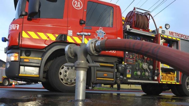 Fire fighters battled a blaze in a scrap metal yard in Reservoir last night.