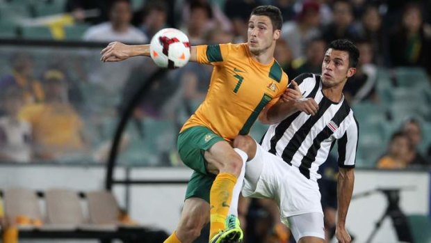 On the move: Socceroo Mathew Leckie contests the ball against Costa Rica in Sydney.