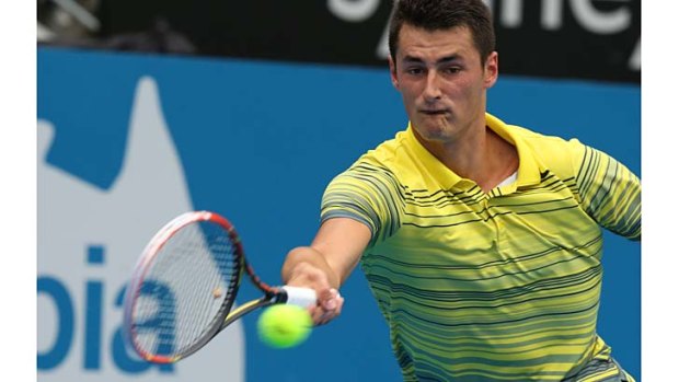Speedy: Bernard Tomic on his way to a win against Blaz Kavcic on Wednesday.