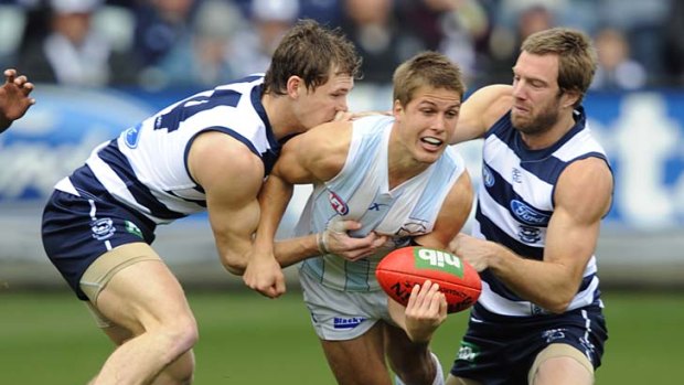 North's Andrew Swallow won't find it easy opposed to the likes of Geelong's Joel Selwood and Joel Corey.