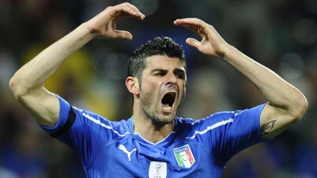 Not happy ... Italy striker Vincenzo Iaquinta reacts after missing.
