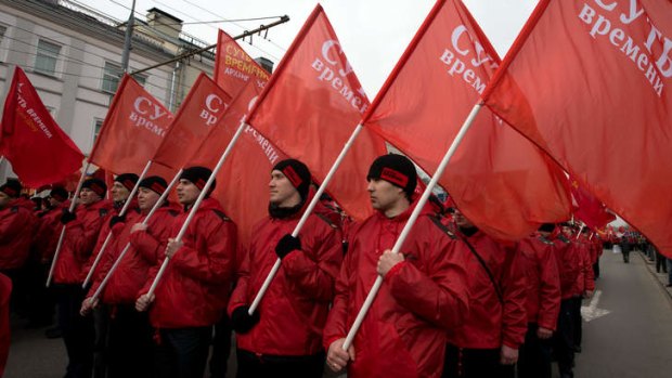 Pro-Kremlin activists march in Moscow at the weekend.
