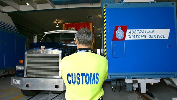 No mobiles: Customs officers will be banned from using mobile phones in secure areas of Australian airports.