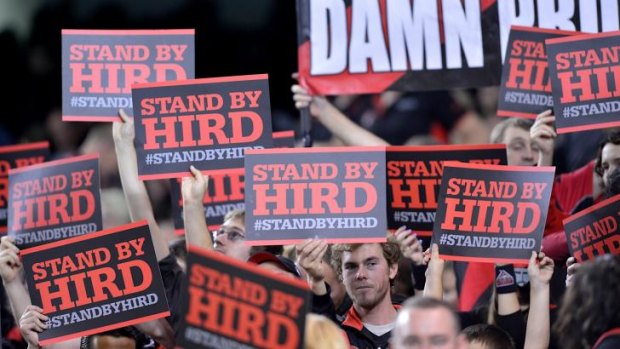 Essendon fans hold up banners in support of James Hird during round 4 in season 2013.