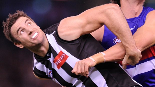 Pushed out: Collingwood's Darren Jolly.