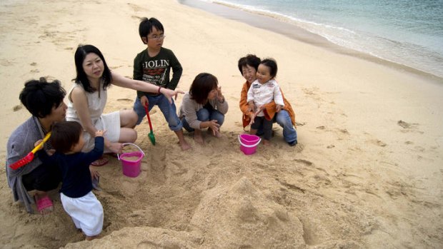 Fukushima fallout refugees meet at Naminoue beach in Okinawa