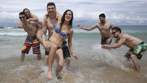 Work and play: Troy Ponting, Lauren Trucksess, Jared Bulach and Katie Vincent at Bondi Beach.