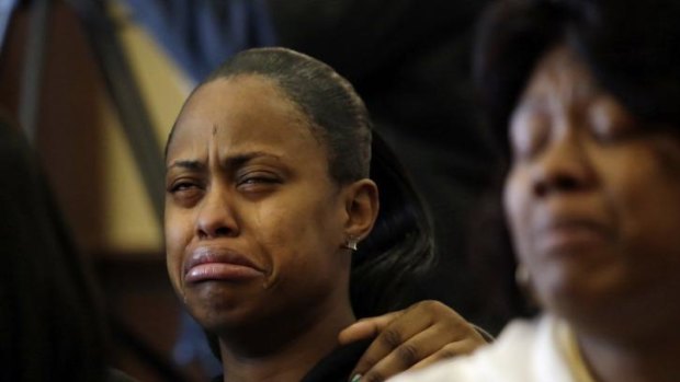 Loved ones of Renisha McBride weep as Theodore Wafer in court in Detroit. 