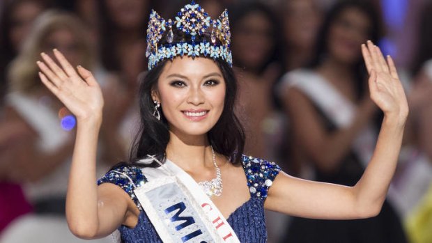 Yu Wenxia of China waves after winning the Miss World 2012 beauty pageant.