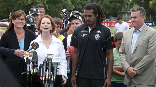 Parliamentary Secretary for Immigration and Multicultural Affairs Kate Lundy, Prime Minister Julia Gillard, Collingwood player Harry O'Brien and Collingwood President Eddie McGuire at the People of Australia Ambassadors announcement in January 2012.