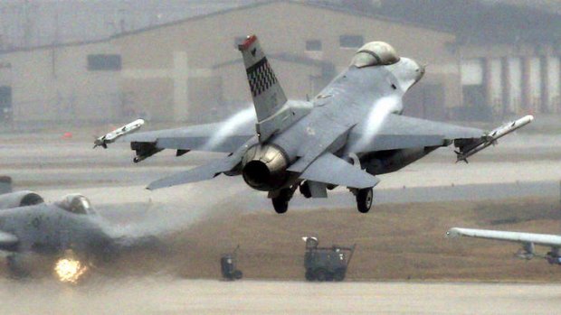 A US Air Force F-16 fighter jet lands at the Osan Air Base in South Korea.