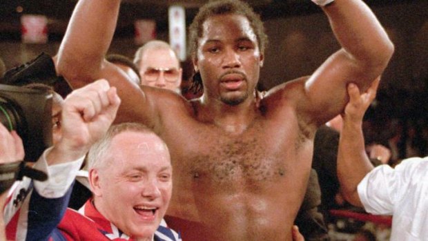Frank Maloney and WBC heavyweight champion Lennox Lewis celebrate his victory over Oliver McCall in Las Vegas in 1997.