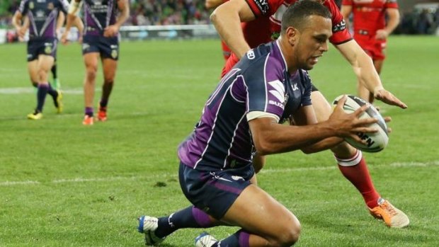 Storm centre Will Chambers scores against the Dragons at AAMI Park.