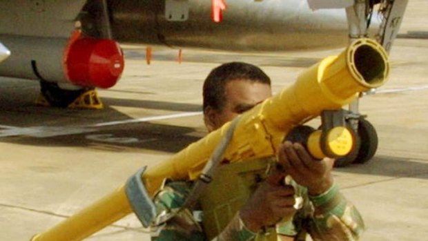 An Indian airman displays the Igla IM missile system, a portable anti-aircraft weapon, similar to those being sought in Libya.