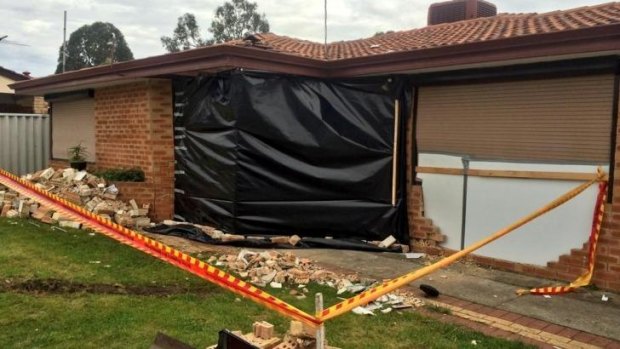 The aftermath of a Thursday night car versus house in Mirrabooka.