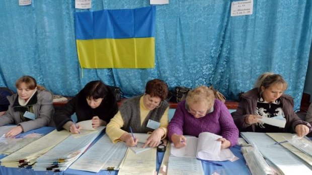 Election day: Members of a district electoral commission work in a polling station in the eastern Ukrainian city of Kramatorsk.