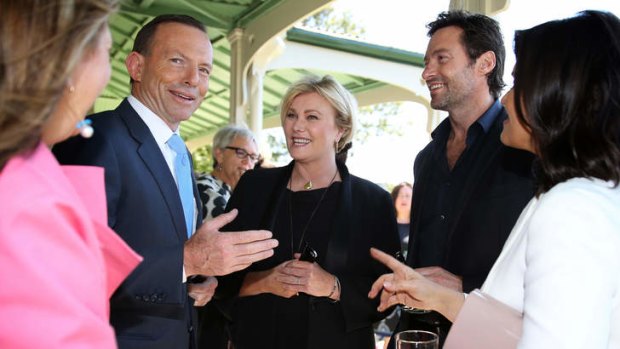 Prime Minister Tony Abbott,  Deborah-Lee Furness and Hugh Jackman at Kirribilli House in Sydney today.