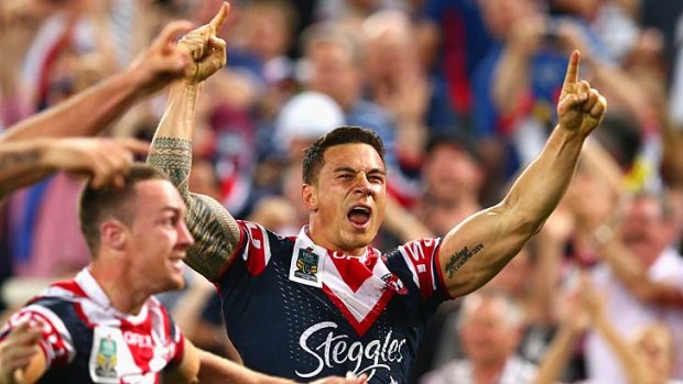 Sonny Bill Williams of the Roosters celebrates after his team defeated Manly to win the NRL grand final.