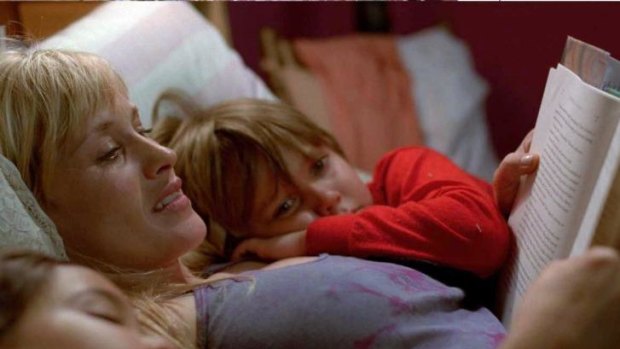 Let the growth begin... Single-mum Olivia (Patricia Arquette) reads a story to her son Mason (Ellar Coltrane) and daughter Samantha (Lorelei Linklater) at the start of <i>Boyhood</i>.