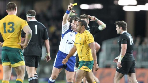 Patience stretched: Welsh whistle-blower Nigel Owens sends Will Genia to the sin bin in a Bledisloe Cup clash last year.