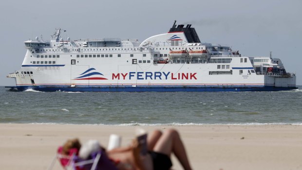 A MyFerryLink car and passenger ferry boat leaves the harbour in Calais, northern France, June 24, 2015. On Tuesday traffic was halted through the Channel Tunnel linking Britain and France after striking French ferry workers set fire to tyres, while Britain's Foreign Office warned of migrants trying to get into vehicles queuing to enter the tunnel. Around 400 workers blockaded the port of Calais to protest restructuring at its MyFerryLink division, the Syndicat Maritime Nord trade union said. Shipping was halted early in the day and both Eurotunnel and Eurostar later suspended their services because of the disruption.  
REUTERS/Christian Hartmann