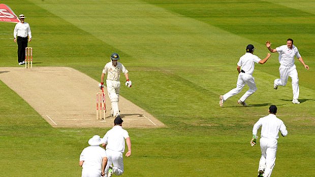 England's Steve Harmison (right) celebrates the wicket of Simon Katich during the first day of the fourth Ashes Test.