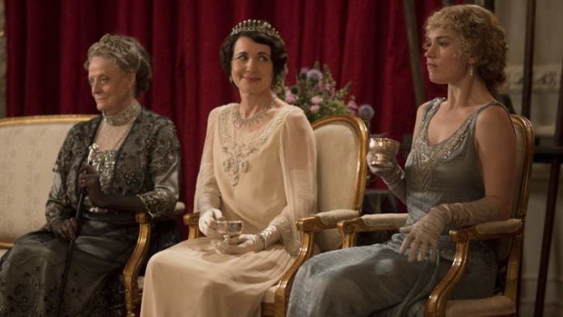 Not being allowed to go to the ball is a common theme for Lily James' characters; she plays Lady Rose, far right, in <i>Downton Abbey</i>.