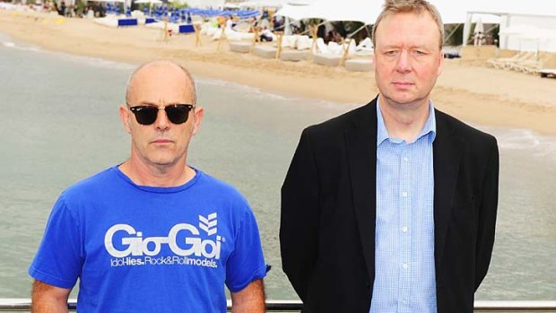 Director Keith Allen (L) and writer Paul Sparks attend the Unlawful Killing photocall in Cannes.