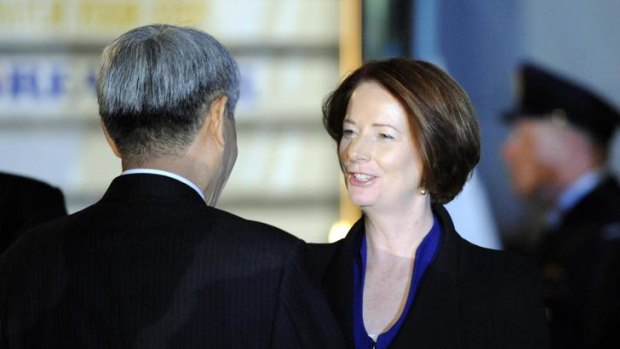 Julia Gillard is greeted on her arrival at Gimpo Airport in Seoul ahead of the 2012 Seoul Nuclear Security Summit.