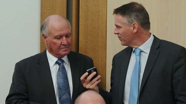 Independent MP Tony Windsor and Rob Oakeshott, during a hearing with representatives from media organisations, at Parliament House on Monday.