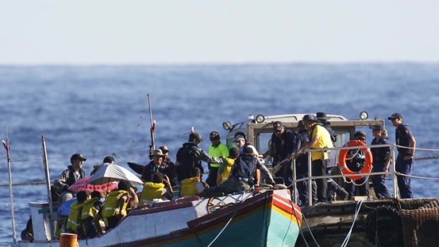 A boat-load of asylum seekers ... Indonesian fisherman Riki Ndun is charged under Australian people-smuggling laws.