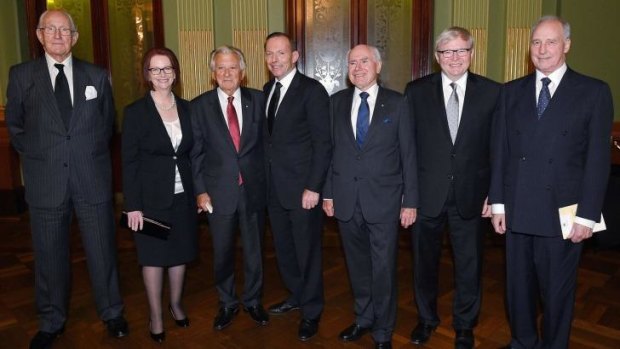 Over in a minute: Prime Minister Tony Abbott (centre) with former Australian prime ministers Malcolm Fraser, Julia Gillard, Bob Hawke, John Howard, Kevin Rudd and Paul Keating, at the completion of the Gough Whitlam memorial service in Sydney.