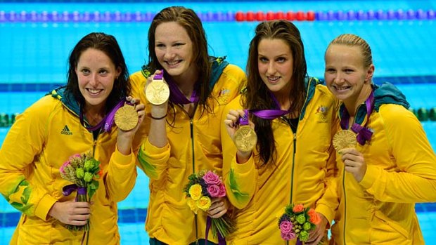 The Aussie four of Alicia Coutts, Cate Campbell,  Brittany Elmslie and Melanie Schlanger show off their medals