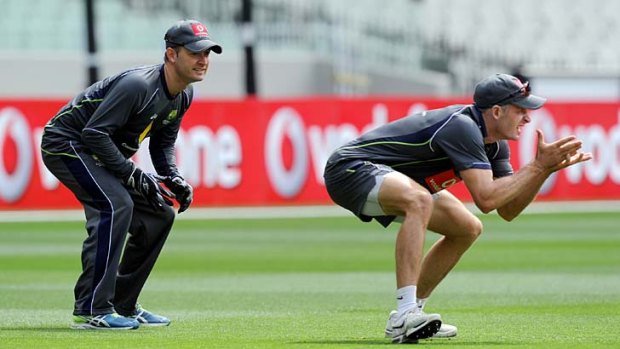 Race against time ... injured skipper Michael Clarke trains with Michael Hussey on Christmas Day.