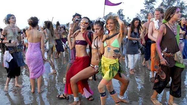 Backpackers enjoy a beach party in Goa, India. Backpackers are dirty and just want to party all the time, right? Wrong.