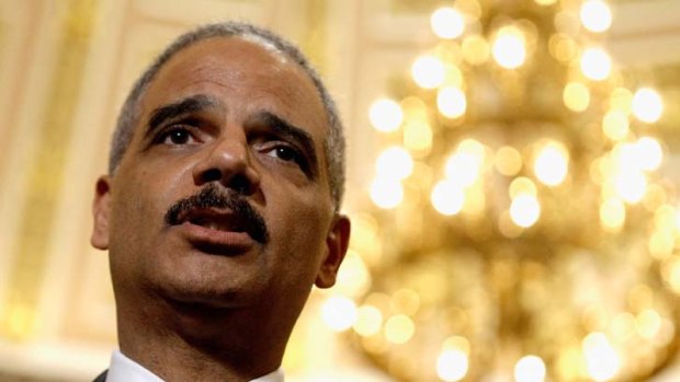 Presidential help ... the US Attorney-General, Eric Holder.