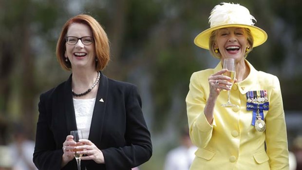 Here's to Canberra: Julia Gillard joins Governor-General Quentin Bryce in toasting the capital's centenary but stops short of actually drinking to the occasion.