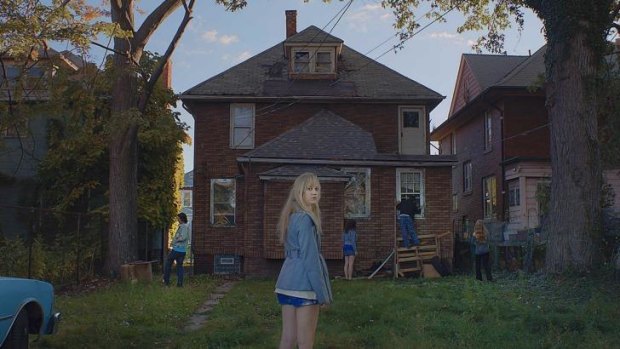 <i>It Follows</i>, a horror film written and directed by David Robert Mitchell, stars Maika Monroe, Keir Gilchrist and Olivia Luccardi.