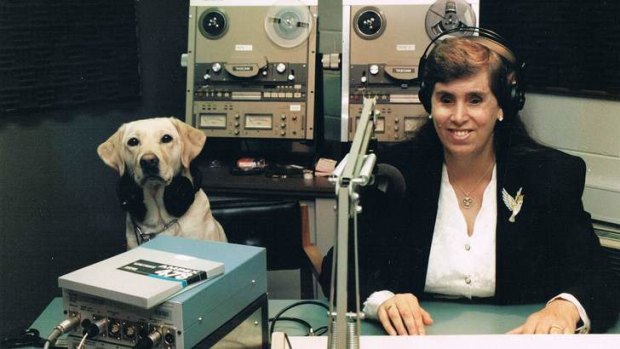 Dog on air ... Elaine Harris and Dori at the ABC's Burnie studio.