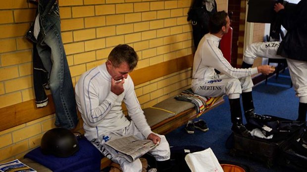 Darren Gauci studying the form before the City of Ballarat Maiden Plate.