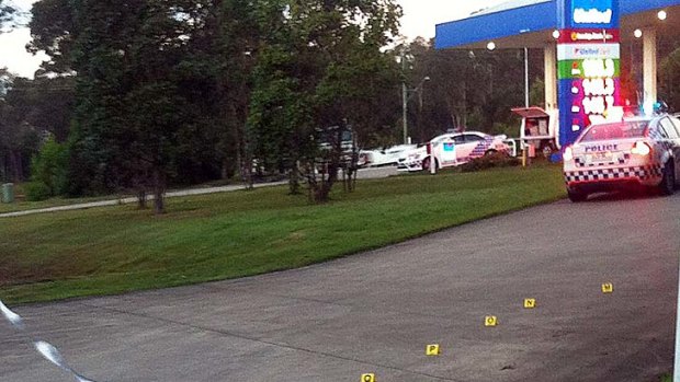 The crime scene established at United Petroleum service station in Park Ridge where a dying man was found this morning.