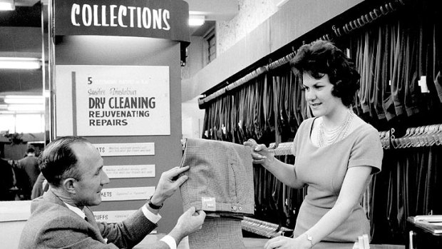 History lost? ... A staff member helps a customer at the collection desk inside the Melbourne Fletcher Jones and Staff store in Queen Street in the early 1950s.