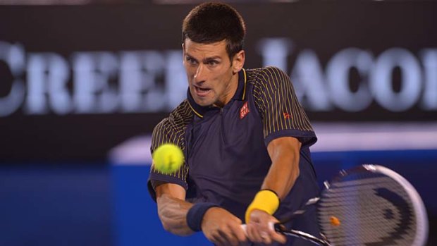 Novak Djokovic is fully focused on the task at hand: demolishing Ryan Harrison.