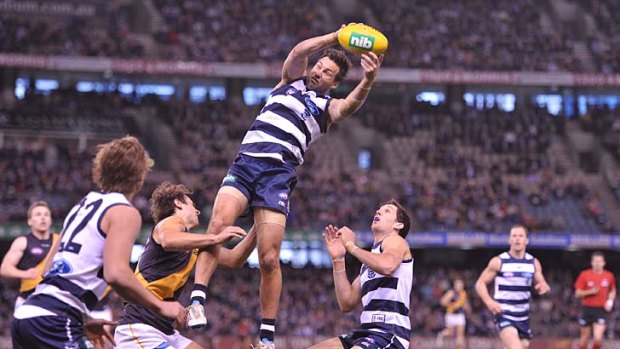 Flying solo: James Bartel takes a clever mark to set up another Cat attack.