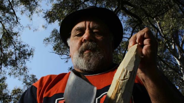 Indigenous story ... Greg Simms has made several tools, including a shield, clubs, digging stick and woomera for the centre's Aborginal display.